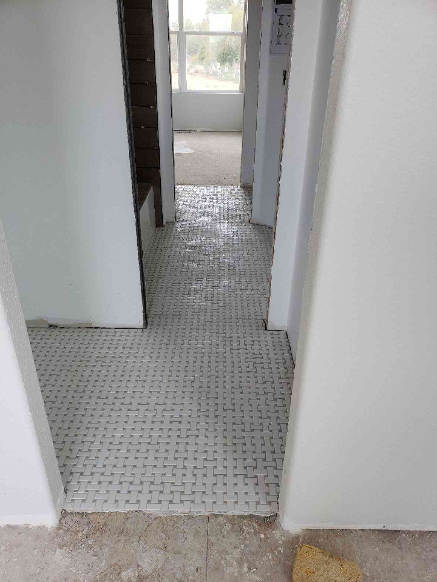 Tile Floor Installation In Jack And Jill Bathroom