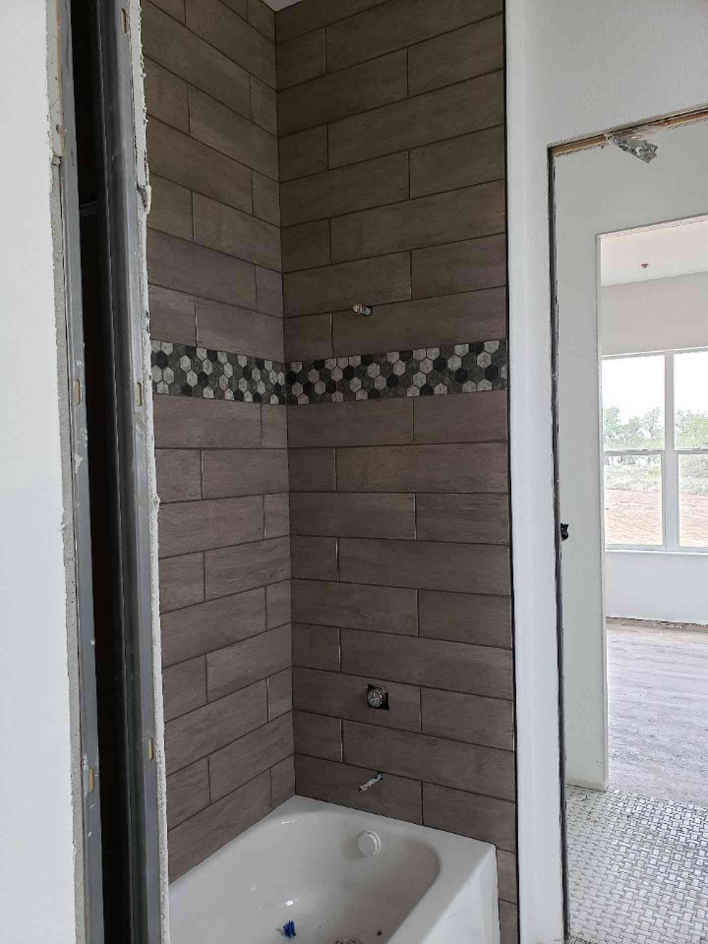 Gorgeous Tile Work in Jack And Jill Bathroom Shower