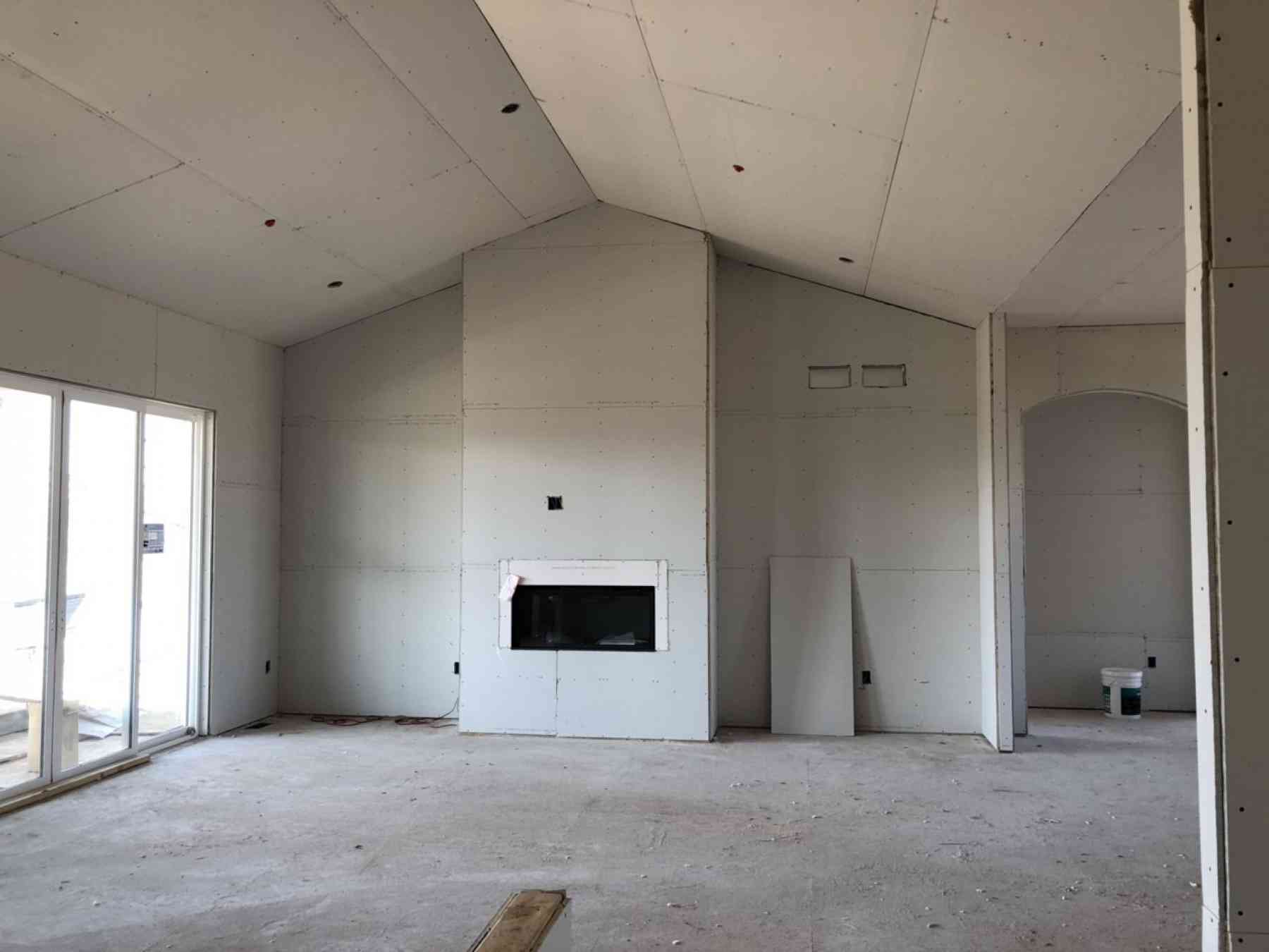 Living Room View During Drywall Installation